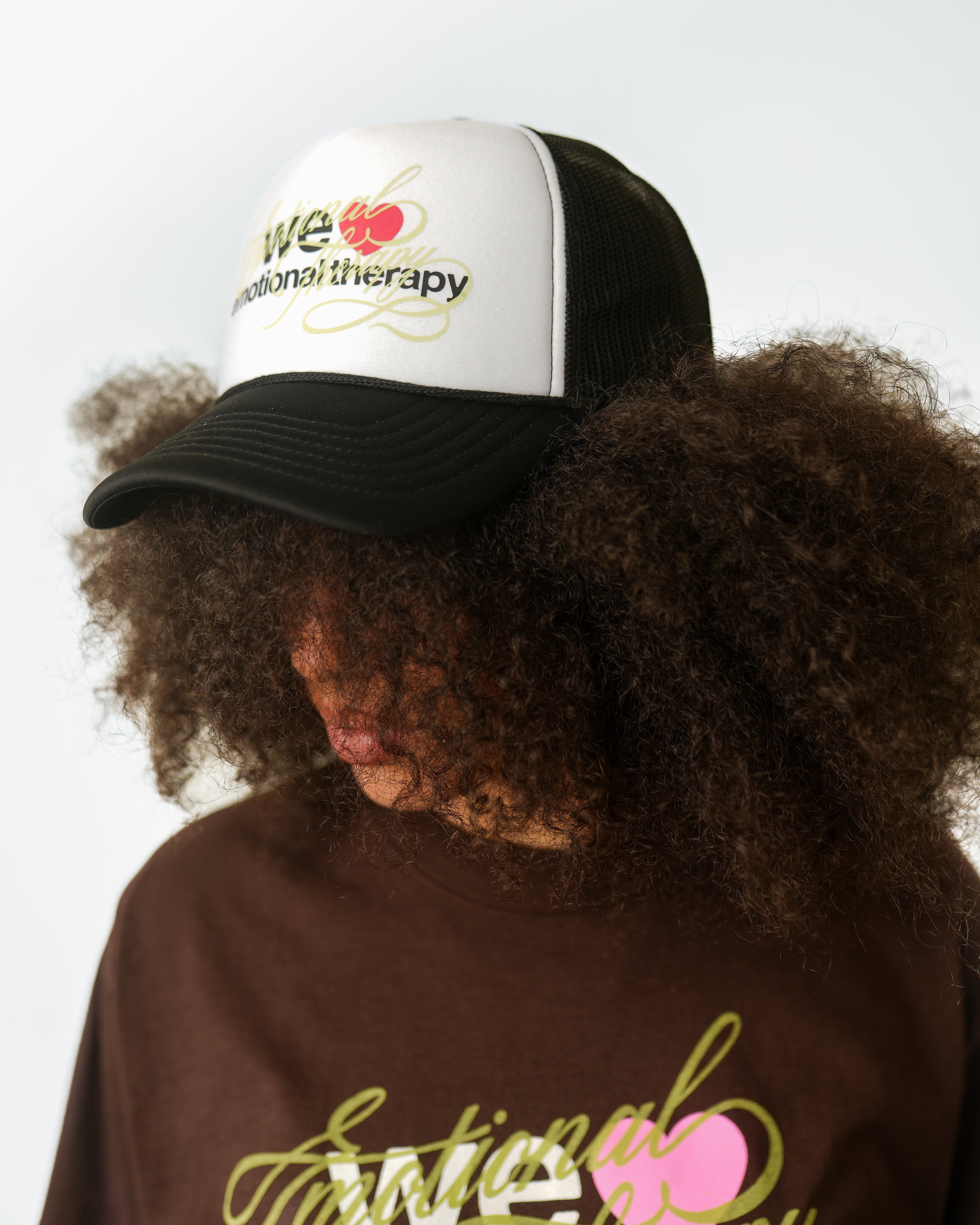 WE ❤️ EMOTIONAL THERAPY TRUCKER CAP (BLACK)
