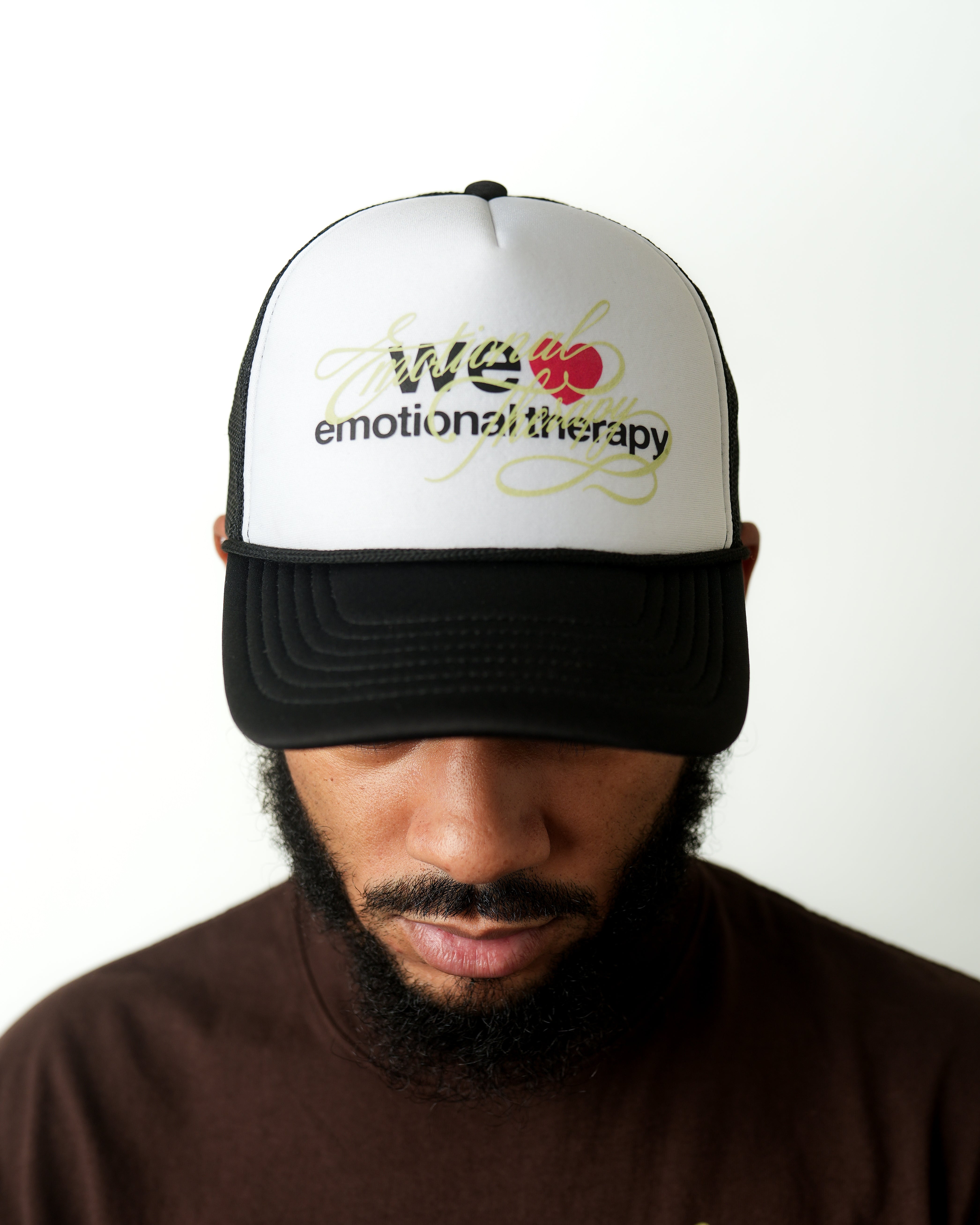 WE ❤️ EMOTIONAL THERAPY TRUCKER CAP (BLACK)